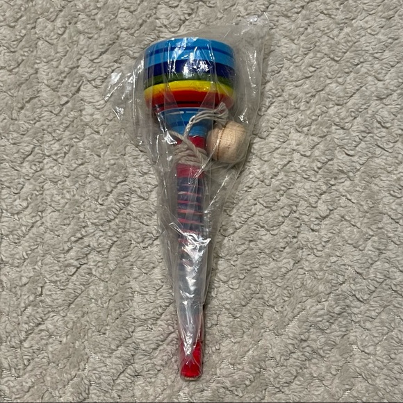 WALT DISNEY WORLD CUP AND BALL TOY - Picture 1 of 3